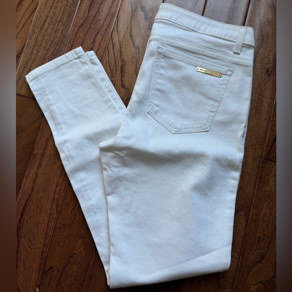 Michael Kors white skinny jeans with gold buttons size 6